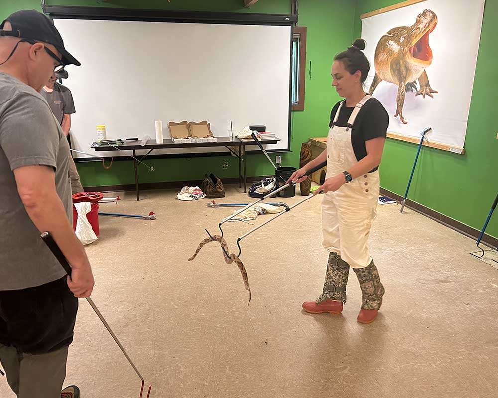 andrea allen handling a snake