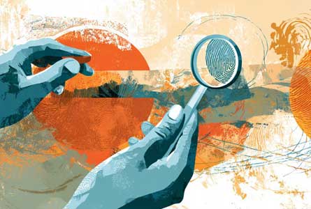 hand holding magnifying glass