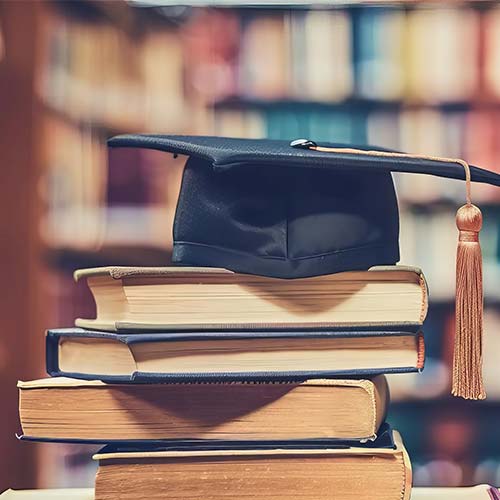 books and grad cap