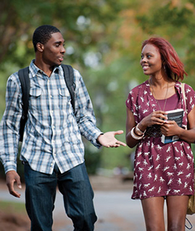 Students walking and discussing issues