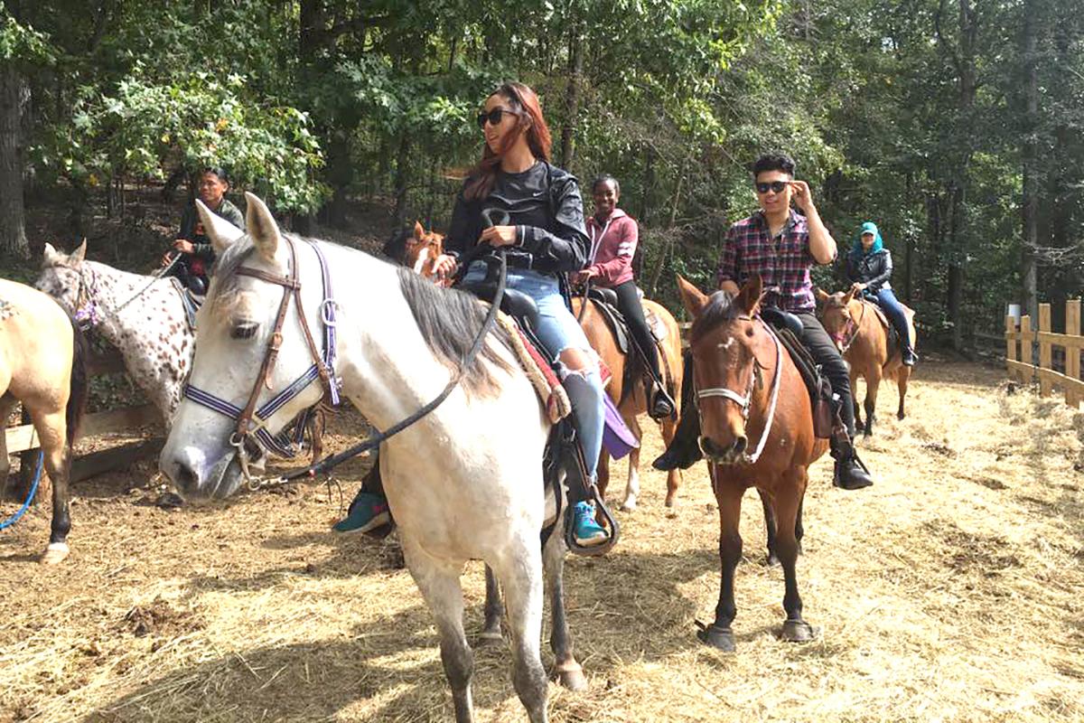 Students horseback riding
