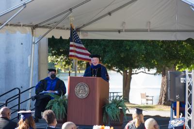 dr. hynes speaking at graduation