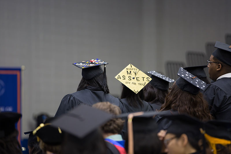 More graduates with different sayings on mortar boards
