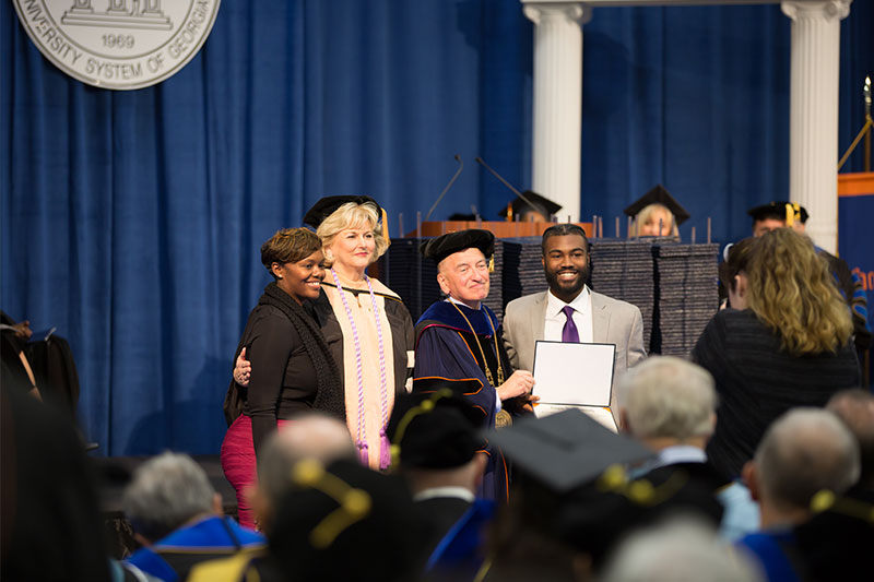 Student receiving an award