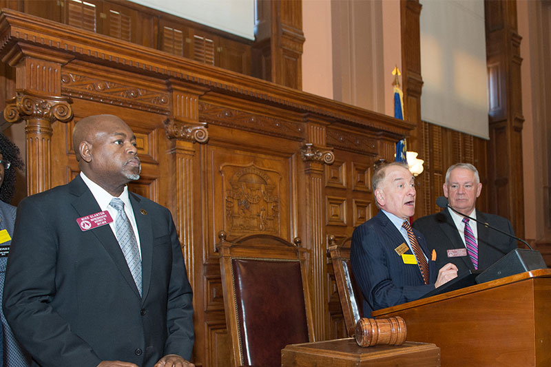 Dr. Hynes speaking at the Capitol