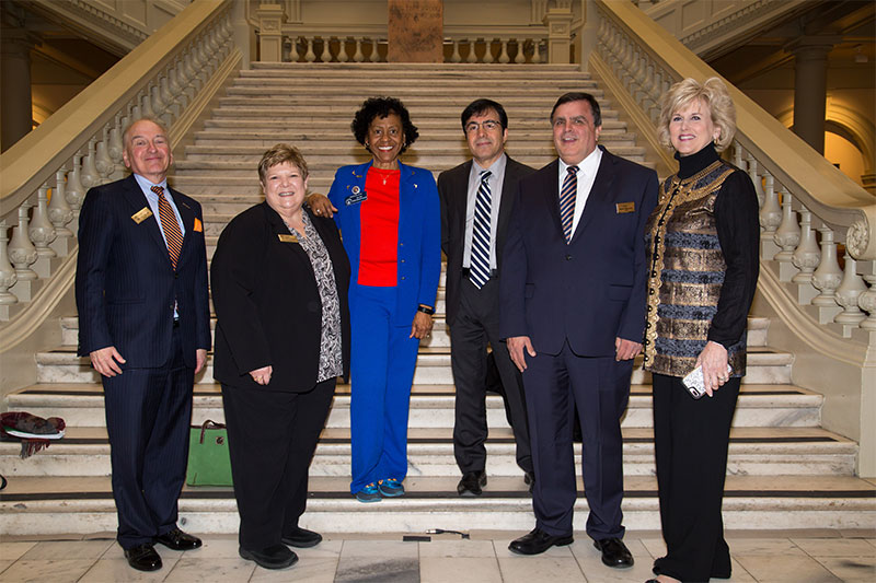 Administration of Clayton State on the stairs of the capitol