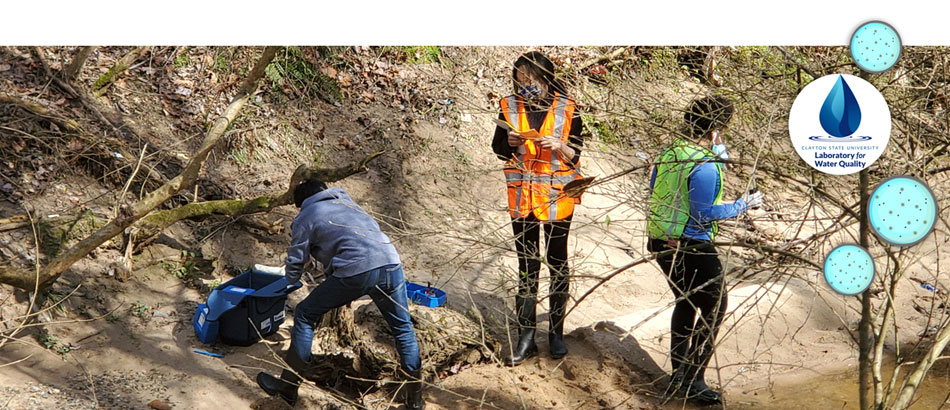 Students taking samples of Flint river water