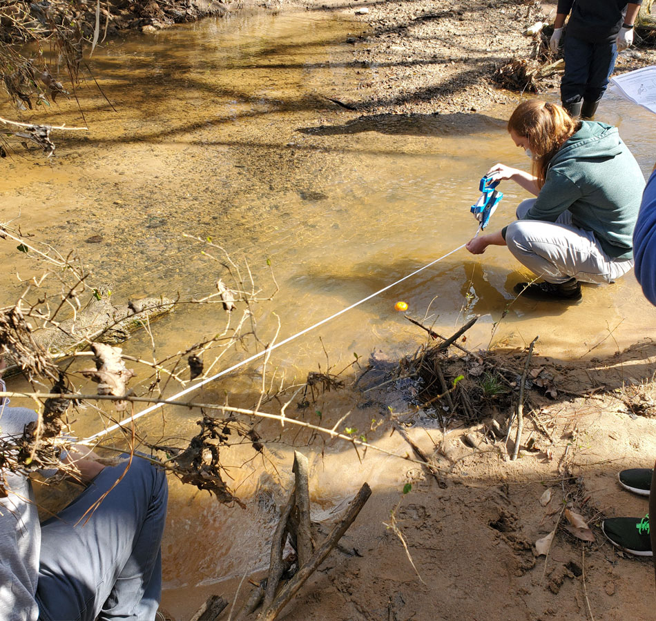 Students sample river water