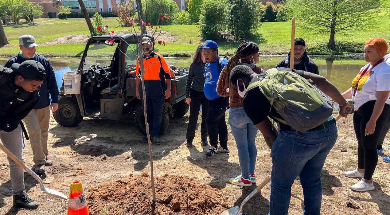 The Clayton State community gathers to plant trees during the committee's 2022 Arbor Day Celebration
