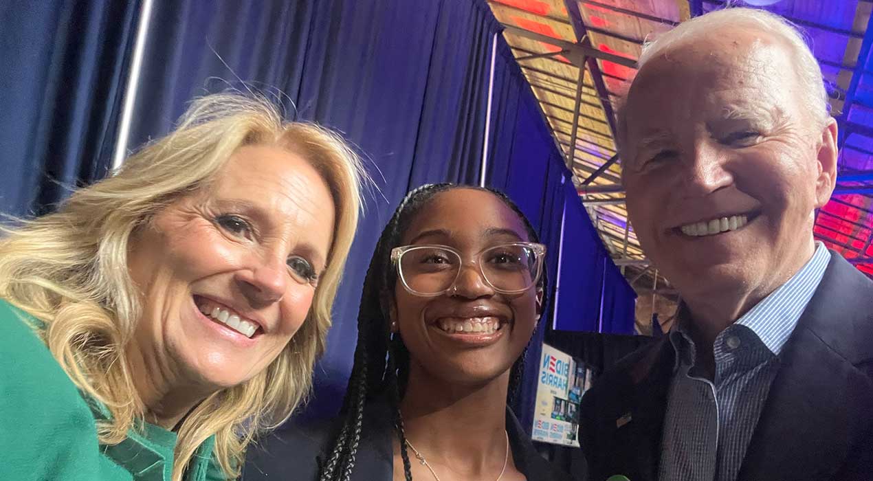 Clayton State junior Desera Lennon takes a selfie with the Bidens at the president's March 2024 campaign rally event