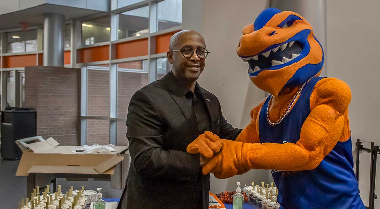 Clayton State University Pres. Georj Lewis and university mascot, Loch