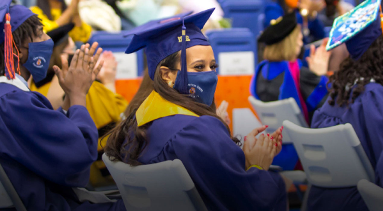 Clayton State President Dr. Georj L. Lewis addresses the Class of 2023 during Spring Commencement