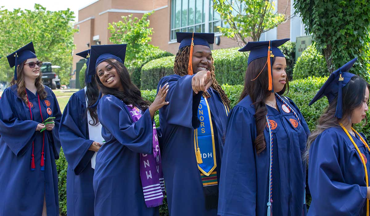 students lining up to graduate