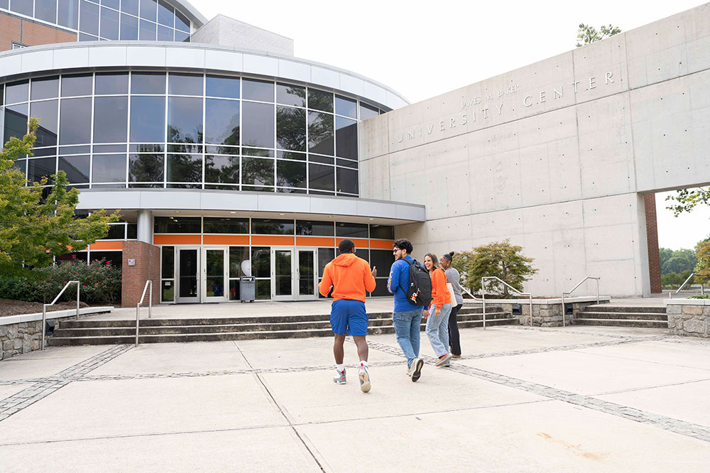 students walking together into a building